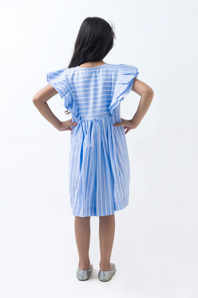 Florette in blue dress