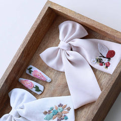 2 Bows and a Tic Tac Set
