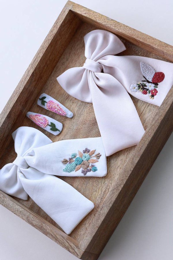 2 Bows and a Tic Tac Set