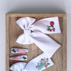 2 Bows and a Tic Tac Set