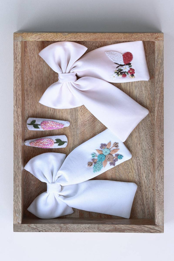 2 Bows and a Tic Tac Set