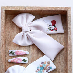 2 Bows and a Tic Tac Set