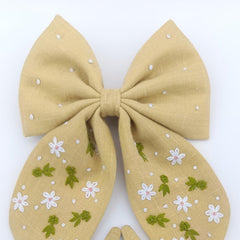 Honeyed Flora set of bow and tic tac set