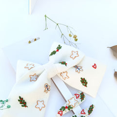 Frosted Fancy Now Bow and a Pair of Tic Tac