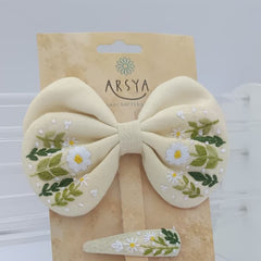 Butterscotch garden set of bow and tic tac set