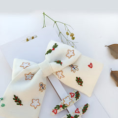 Frosted Fancy Now Bow and a Pair of Tic Tac