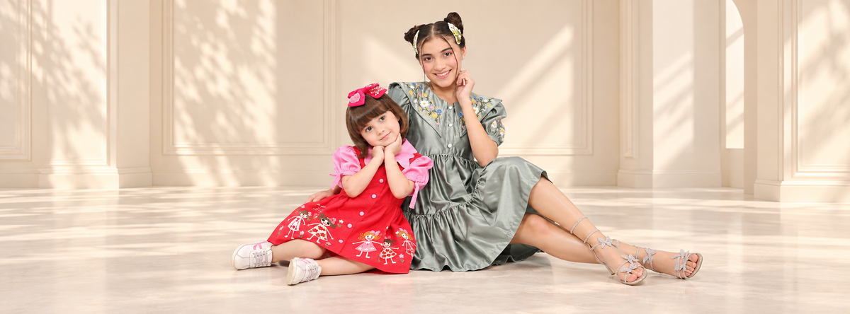 Warm Studio Portrait of Two Girls