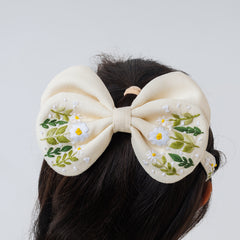 Butterscotch garden set of bow and tic tac set
